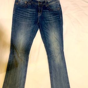 Size 31, boot cut Miss Me jeans. Rarely worn. Like new.